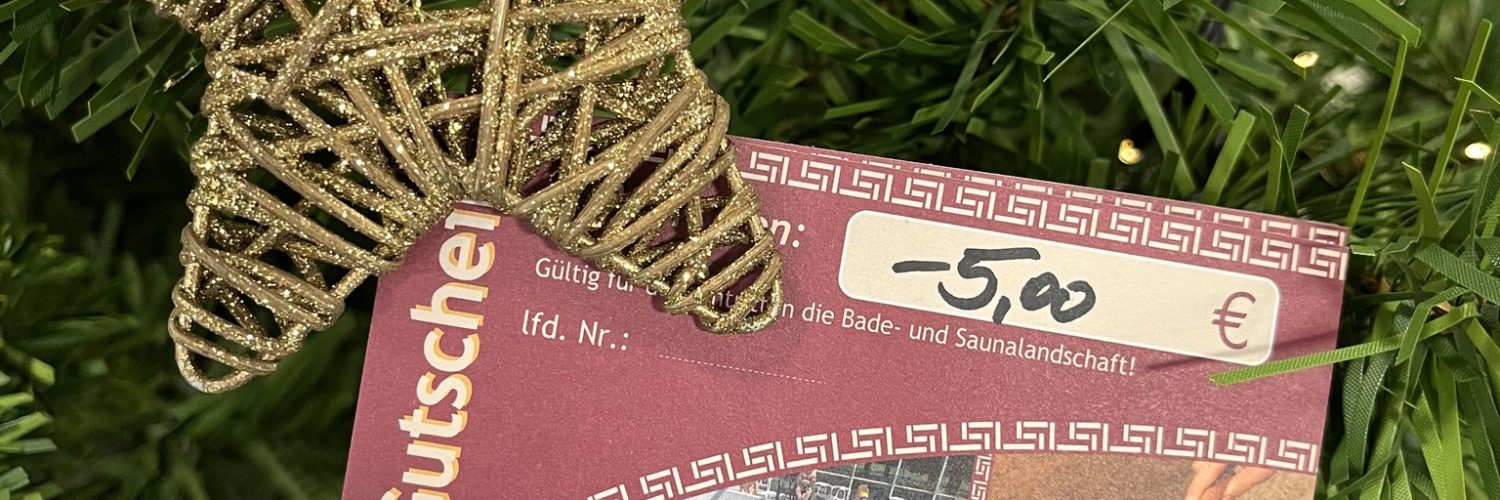 Gutschein am Weihnachtsbaum